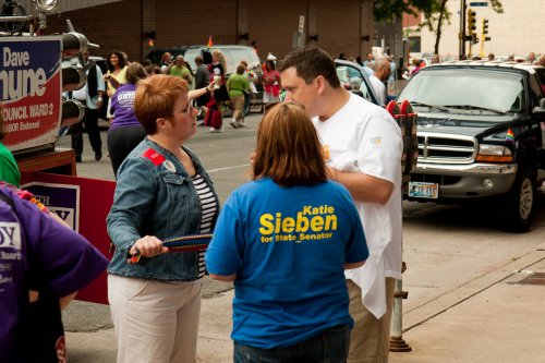 Rep. Erin Murphy chats with former Rep. Karla Bigham and DFL Party Chair Ken Martin.